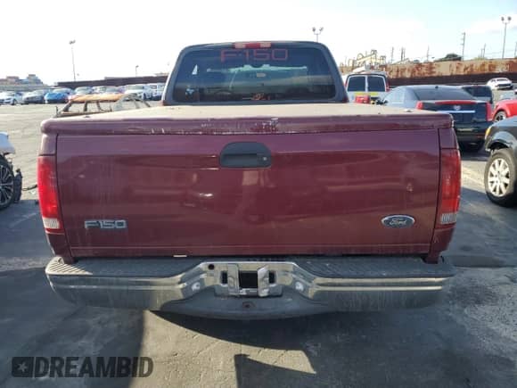 2003 Ford F-150 XL with VIN 1FTRX17W33NA89735, listed as a Copart auction lot 81902025 with 243,918 mi miles and Salvage title. Bid and sale history available at DreamBid. Image 6.