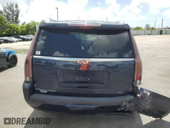 2018 Cadillac Escalade Luxury with VIN 1GYS3BKJ7JR260064, listed as a Copart auction lot 61089915 with 112,720 mi miles and Salvage title. Bid and sale history available at DreamBid. Image 6.