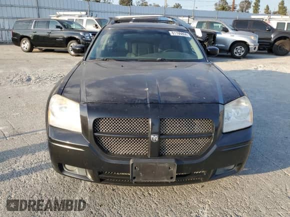 2005 Dodge Magnum SXT with VIN 2D8GZ48V95H648551, listed as a Copart auction lot 81199894 with 210,231 mi miles and Salvage title. Bid and sale history available at DreamBid. Image 5.