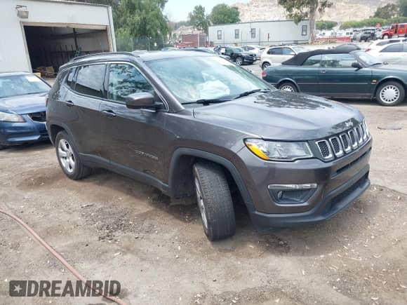 2021 Jeep Compass Altitude with VIN 3C4NJCBB0MT598778, listed as a IAAI auction lot 42416749 with 90,314 mi miles and . Bid and sale history available at DreamBid. Image 1.