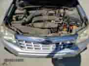 2011 Subaru Forester X z VIN JF2SHABC0BG704032, wystawiony jako Copart lot #68968225 z przebiegiem 148 742 mil mil oraz Czysty tytuł • Clean title. Historia ofert i sprzedaży dostępna na DreamBid. Obrazek 11.