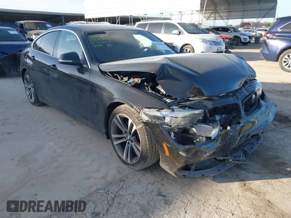 2018 BMW 4 Series 430i with VIN WBA4J1C55JBG76042, listed as a IAAI auction lot 42860141 with 96,052 mi miles and . Bid and sale history available at DreamBid. Image 1.