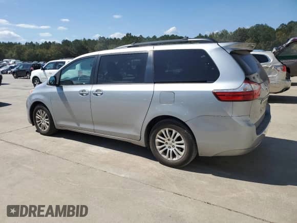 2015 Toyota Sienna XLE with VIN 5TDYK3DC7FS617615, listed as a Copart auction lot 82091105 with 157,852 mi miles and Clean title. Bid and sale history available at DreamBid. Image 2.