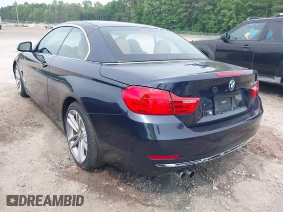 2016 BMW 4 Series 428i with VIN WBA3V7C5XG5A28917, listed as a IAAI auction lot 42275899 with 90,050 mi miles and . Bid and sale history available at DreamBid. Image 3.
