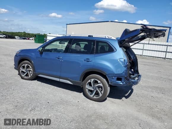 2023 Subaru Forester Touring z VIN JF2SKARC8PH545785, wystawiony jako Copart lot #61219105 z przebiegiem 9 841 mil mil oraz Szkoda całkowita • Salvage title. Historia ofert i sprzedaży dostępna na DreamBid. Obrazek 2.