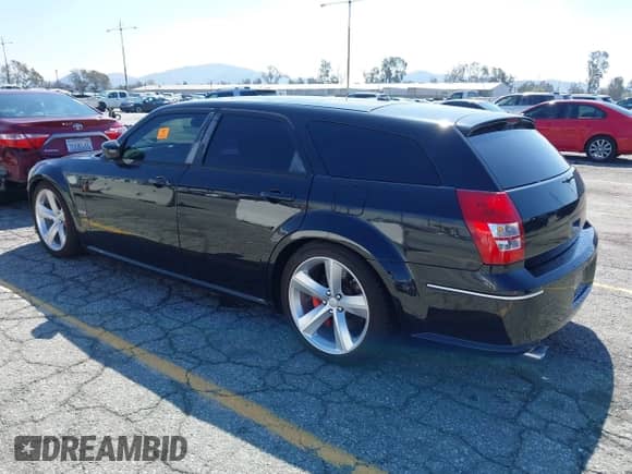 2007 Dodge Magnum SRT-8 z VIN 2D4GV773X7H654618, wystawiony jako IAAI lot #41752289 z przebiegiem 103 819 mil mil oraz . Historia ofert i sprzedaży dostępna na DreamBid. Obrazek 3.