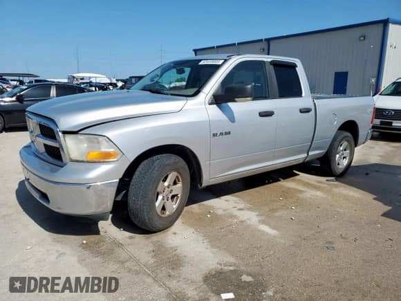 2009 Dodge 1500 SLT with VIN 1D3HB18P09S727216, listed as a Copart auction lot 63449005 with 242,630 mi miles and Clean title. Bid and sale history available at DreamBid. Image 1.
