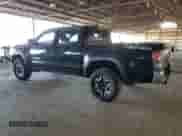 2023 Toyota Tacoma SR5 z VIN 3TMAZ5CN6PM199822, wystawiony jako Copart lot #84072485 z przebiegiem 58 711 mil mil oraz Szkoda całkowita • Salvage title. Historia ofert i sprzedaży dostępna na DreamBid. Obrazek 2.