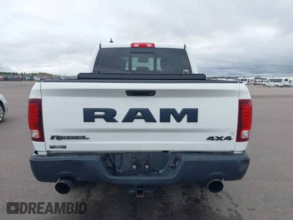 2018 Ram 1500 Rebel with VIN 1C6RR7YT8JS150942, listed as a IAAI auction lot 42168638 with 99,060 mi miles and . Bid and sale history available at DreamBid. Image 16.
