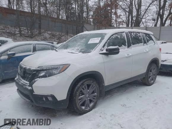 2019 Honda Passport EX-L with VIN 5FNYF8H53KB029769, listed as a IAAI auction lot 41311354 with 41,070 mi miles and . Bid and sale history available at DreamBid. Image 2.