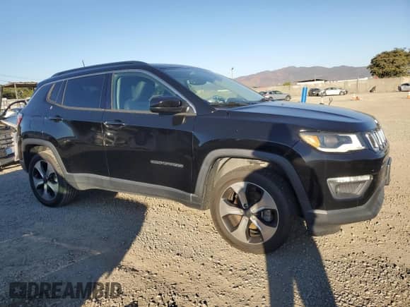 2020 Jeep Compass Latitude with VIN 3C4NJDBB2LT222085, listed as a Copart auction lot 82641105 with 74,258 mi miles and Clean title. Bid and sale history available at DreamBid. Image 4.