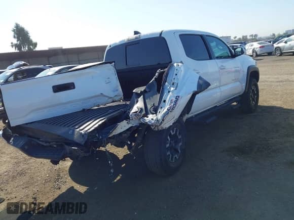 2021 Toyota Tacoma SR5 with VIN 5TFAZ5CN3MX111802, listed as a IAAI auction lot 41825288 with 45,166 mi miles and . Bid and sale history available at DreamBid. Image 4.