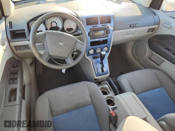 2007 Dodge Caliber SXT with VIN 1B3HB48B87D109532, listed as a Copart auction lot 82186725 with 222,900 mi miles and Salvage title. Bid and sale history available at DreamBid. Image 8.