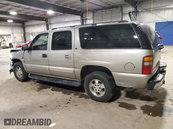 2003 Chevrolet Suburban LT z VIN 1GNFK16Z53J282237, wystawiony jako Copart lot #56275545 z przebiegiem 129 384 mil mil oraz Szkoda całkowita • Salvage title. Historia ofert i sprzedaży dostępna na DreamBid. Obrazek 2.