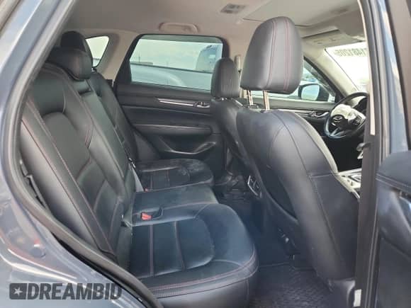 2023 Mazda CX-5 S Carbon Edition с VIN JM3KFBCM4P0160725, выставлен на аукционе Copart как лот 71481205 с пробегом 28 608 миль миль и Списание • Salvage title. История ставок и продаж доступна на DreamBid. Изображение 11.