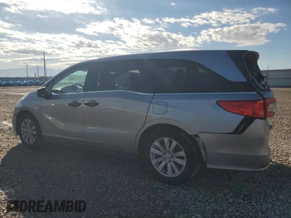 2018 Honda Odyssey LX with VIN 5FNRL6H22JB100093, listed as a Copart auction lot 84522455 with 260,624 mi miles and Salvage title. Bid and sale history available at DreamBid. Image 2.
