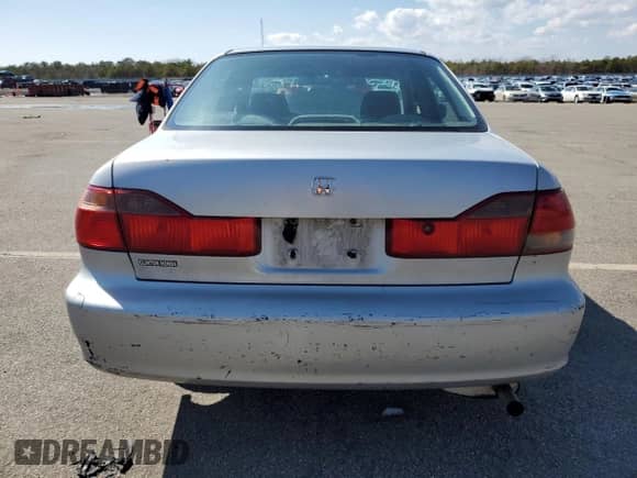 2000 Honda Accord LX с VIN 1HGCG6558YA106929, выставлен на аукционе Copart как лот 50229935 с пробегом 244 574 миль миль и Списание • Salvage title. История ставок и продаж доступна на DreamBid. Изображение 6.