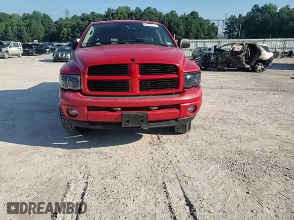 2004 Dodge 1500 SLT z VIN 1D7HU18NX4J261459, wystawiony jako Copart lot #66524055 z przebiegiem 150 963 mil mil oraz Szkoda całkowita • Salvage title. Historia ofert i sprzedaży dostępna na DreamBid. Obrazek 13.