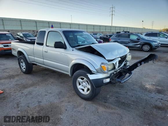 2003 Toyota Tacoma с VIN 5TEWN72NX3Z169900, выставлен на аукционе Copart как лот 80575545 с пробегом Не указан миль и Списание • Salvage title. История ставок и продаж доступна на DreamBid. Изображение 4.