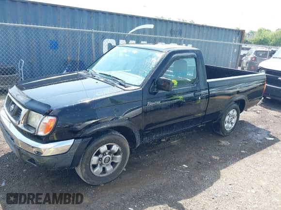 1998 Nissan Frontier XE with VIN 1N6DD21S5WC305516, listed as a IAAI auction lot 42128088 with Not provided miles and . Bid and sale history available at DreamBid. Image 2.