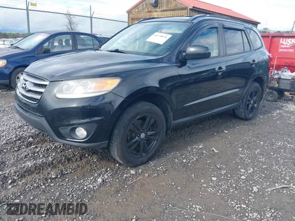 2012 Hyundai Santa Fe SE z VIN 5XYZH4AG5CG096869, wystawiony jako IAAI lot #43278076 z przebiegiem 185 721 mil mil oraz . Historia ofert i sprzedaży dostępna na DreamBid. Obrazek 2.