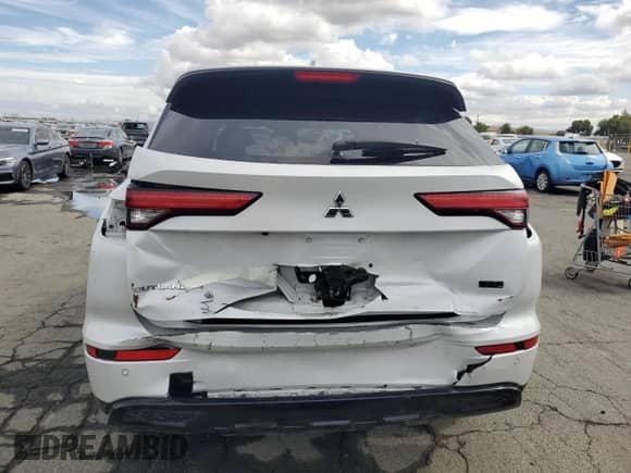 2023 Mitsubishi Outlander SE with VIN JA4J3UA84PZ034708, listed as a Copart auction lot 84960815 with 127,143 mi miles and Salvage title. Bid and sale history available at DreamBid. Image 6.