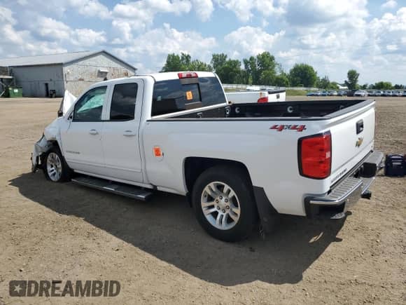 2018 Chevrolet Silverado 1500 LT with VIN 1GCVKREC8JZ297474, listed as a Copart auction lot 67823335 with 73,488 mi miles and Clean title. Bid and sale history available at DreamBid. Image 2.