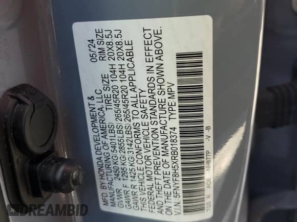 2024 Honda Passport EX-L with VIN 5FNYF8H5XRB018374, listed as a Copart auction lot 60676545 with 30,898 mi miles and Salvage title. Bid and sale history available at DreamBid. Image 13.