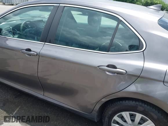 2022 Toyota Camry Hybrid LE with VIN 4T1C31AK9NU036999, listed as a IAAI auction lot 42741455 with 68,970 mi miles and . Bid and sale history available at DreamBid. Image 15.