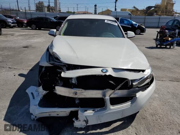 2016 BMW 3 Series 320i with VIN WBA8A9C59GK617288, listed as a Copart auction lot 83758035 with 61,547 mi miles and Salvage title. Bid and sale history available at DreamBid. Image 5.