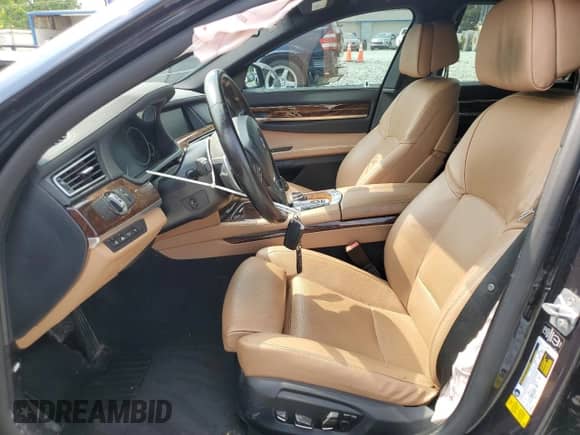 2014 BMW 7 Series 740i с VIN WBAYA6C57ED826660, выставлен на аукционе Copart как лот 59566945 с пробегом 95 828 миль миль и Списание • Salvage title. История ставок и продаж доступна на DreamBid. Изображение 7.