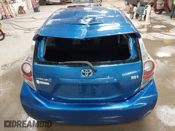 2014 Toyota Prius One z VIN JTDKDTB30E1559751, wystawiony jako IAAI lot #42591558 z przebiegiem 127 520 mil mil oraz . Historia ofert i sprzedaży dostępna na DreamBid. Obrazek 6.