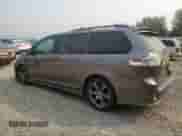 2011 Toyota Sienna SE with VIN 5TDXK3DC8BS106629, listed as a Copart auction lot 71554715 with 144,579 mi miles and Salvage title. Bid and sale history available at DreamBid. Image 2.