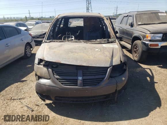 2007 Dodge Caravan with VIN 1D4GP23R77B245458, listed as a Copart auction lot 69581604 with Not provided miles and Non repairable. Bid and sale history available at DreamBid. Image 5.
