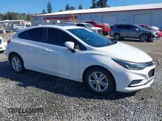 2018 Chevrolet Cruze LT z VIN 3G1BE6SM0JS558673, wystawiony jako IAAI lot #43279143 z przebiegiem 180 522 mil mil oraz . Historia ofert i sprzedaży dostępna na DreamBid. Obrazek 1.