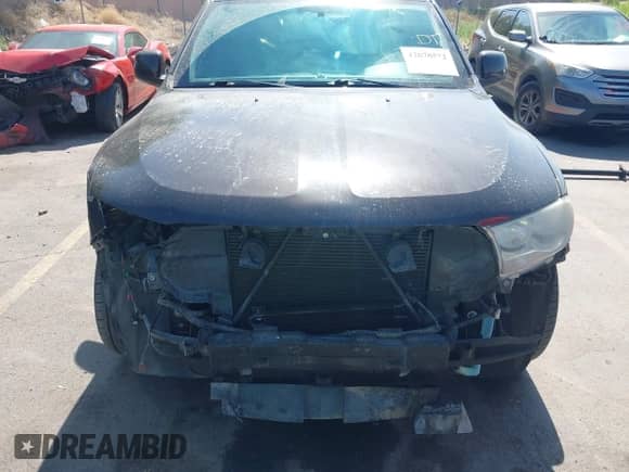 2013 Dodge Durango SXT with VIN 1C4RDHAG4DC552529, listed as a IAAI auction lot 42678572 with 126,428 mi miles and . Bid and sale history available at DreamBid. Image 13.