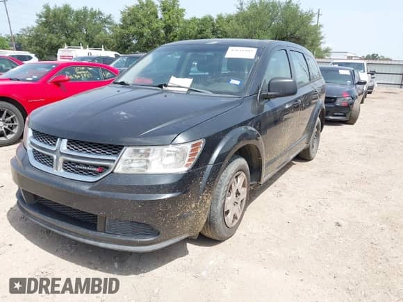 2012 Dodge Journey SE z VIN 3C4PDCAB5CT275973, wystawiony jako IAAI lot #42631803 z przebiegiem 120 440 mil mil oraz . Historia ofert i sprzedaży dostępna na DreamBid. Obrazek 2.