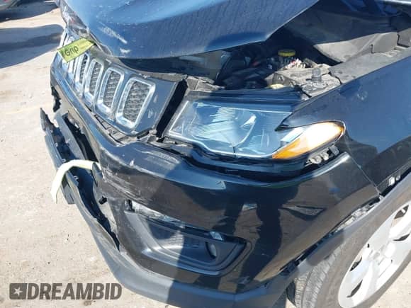 2020 Jeep Compass Latitude with VIN 3C4NJCBB7LT133977, listed as a IAAI auction lot 40950290 with 71,428 mi miles and . Bid and sale history available at DreamBid. Image 6.