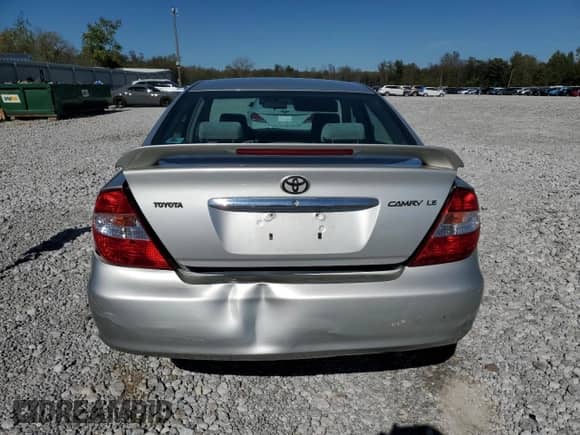 2002 Toyota Camry LE z VIN 4T1BE32K12U109777, wystawiony jako Copart lot #86157775 z przebiegiem 241 982 mil mil oraz Szkoda całkowita • Salvage title. Historia ofert i sprzedaży dostępna na DreamBid. Obrazek 6.