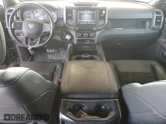 2020 Ram 1500 Rebel z VIN 1C6SRFLT4LN385004, wystawiony jako Copart lot #81076245 z przebiegiem 74 355 mil mil oraz Szkoda całkowita • Salvage title. Historia ofert i sprzedaży dostępna na DreamBid. Obrazek 8.