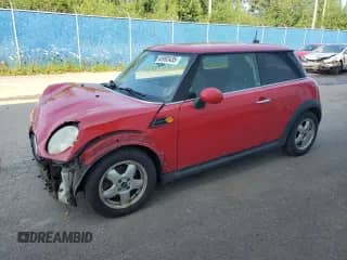 2011 MINI Hardtop with VIN WMWSU3C52BT099344, listed as a Copart auction lot 65992435 with 168,831 mi miles and Salvage title. Bid and sale history available at DreamBid. Image 1.