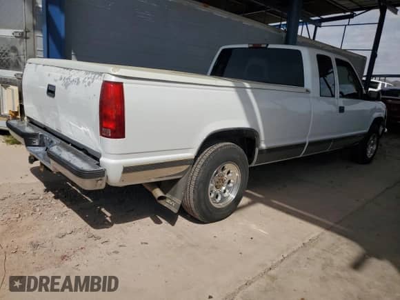 1996 Chevrolet Silverado 2500 с VIN 1GCGC29J7TE263932, выставлен на аукционе Copart как лот 51643115 с пробегом 105 102 миль миль и Списание • Salvage title. История ставок и продаж доступна на DreamBid. Изображение 3.