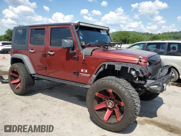 2008 Jeep Wrangler Unlimited X z VIN 1J4GA39148L574890, wystawiony jako Copart lot #62991305 z przebiegiem 187 036 mil mil oraz Szkoda całkowita • Salvage title. Historia ofert i sprzedaży dostępna na DreamBid. Obrazek 4.