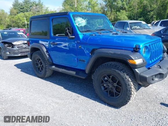 2022 Jeep Wrangler Sport S with VIN 1C4GJXAG0NW145642, listed as a IAAI auction lot 42112670 with 8,737 mi miles and . Bid and sale history available at DreamBid. Image 1.