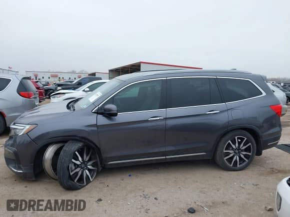 2021 Honda Pilot Touring 7-Passenger с VIN 5FNYF5H69MB009391, выставлен на аукционе IAAI как лот 41708971 с пробегом 64 100 миль миль и . История ставок и продаж доступна на DreamBid. Изображение 14.