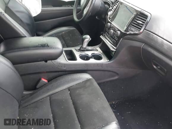 2021 Jeep Grand Cherokee Laredo X with VIN 1C4RJFAG6MC623212, listed as a IAAI auction lot 42190470 with 57,888 mi miles and . Bid and sale history available at DreamBid. Image 5.