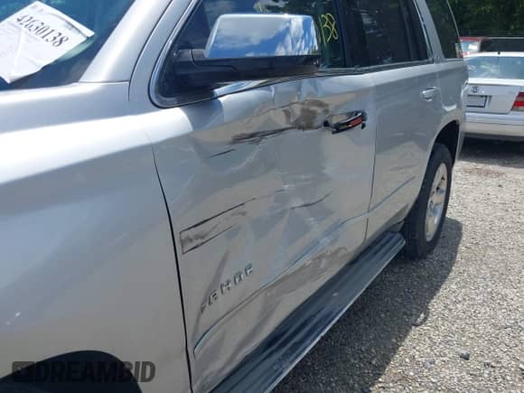 2015 Chevrolet Tahoe LTZ with VIN 1GNSCCKC9FR293871, listed as a IAAI auction lot 42630138 with 205,056 mi miles and . Bid and sale history available at DreamBid. Image 6.