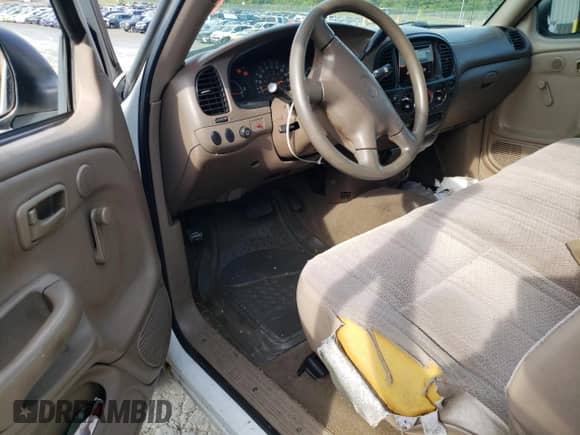 2002 Toyota Tundra z VIN 5TBJN32112S221774, wystawiony jako Copart lot #68450155 z przebiegiem 490 065 mil mil oraz Szkoda całkowita • Salvage title. Historia ofert i sprzedaży dostępna na DreamBid. Obrazek 8.