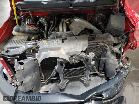 2012 Chevrolet Silverado 1500 Work Truck z VIN 1GCNKPEA4CZ100743, wystawiony jako Copart lot #70768315 z przebiegiem 183 019 mil mil oraz Szkoda całkowita • Salvage title. Historia ofert i sprzedaży dostępna na DreamBid. Obrazek 11.
