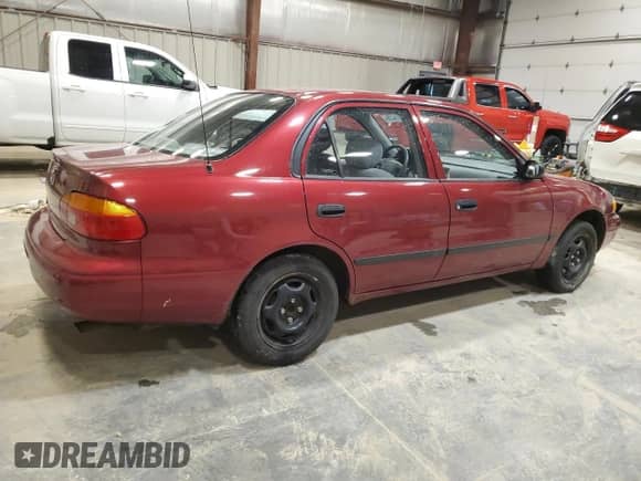 2000 Chevrolet Prizm LSi с VIN 1Y1SK5289YZ401410, выставлен на аукционе Copart как лот 57581435 с пробегом Не указан миль и На запчасти • Non repairable. История ставок и продаж доступна на DreamBid. Изображение 3.